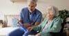 Clinician reviewing results with member in home