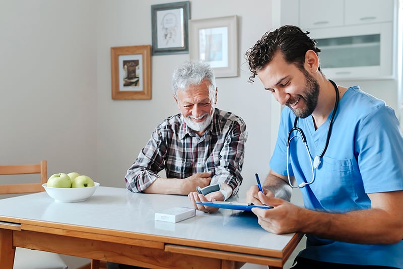 sh-male-nurse-checking-blood-pressure