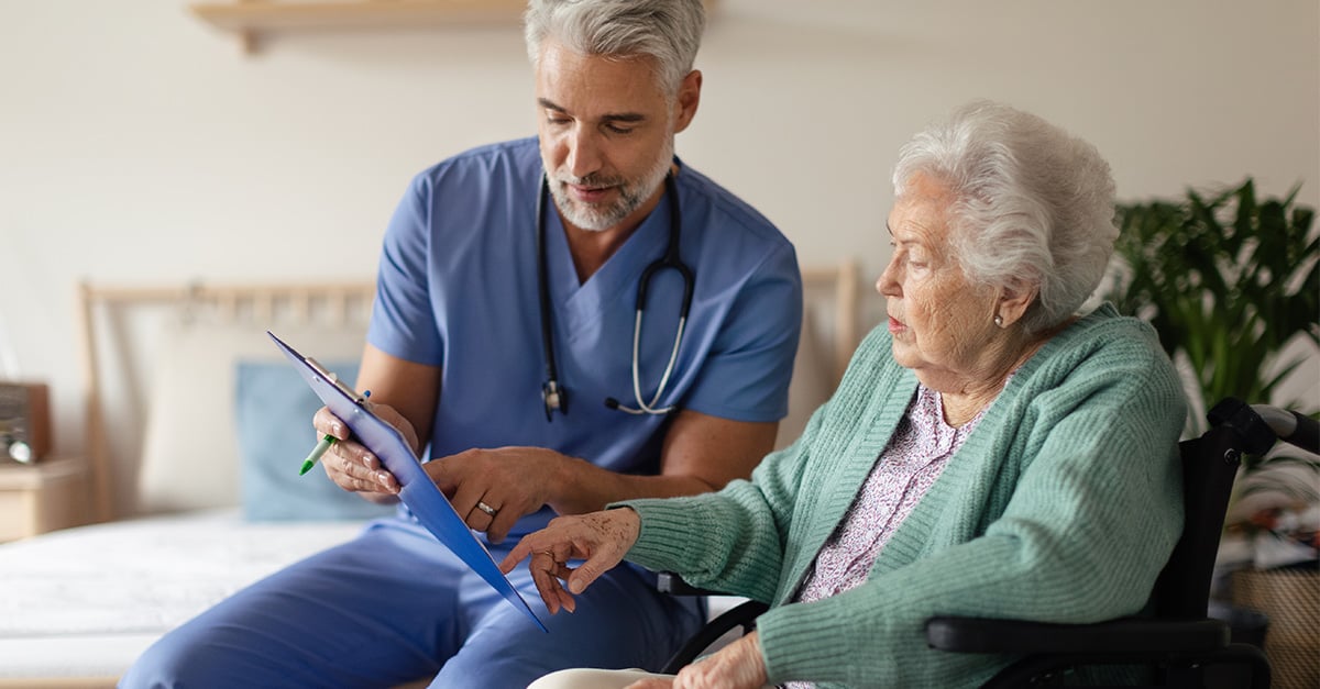 Clinician reviewing results with member in home