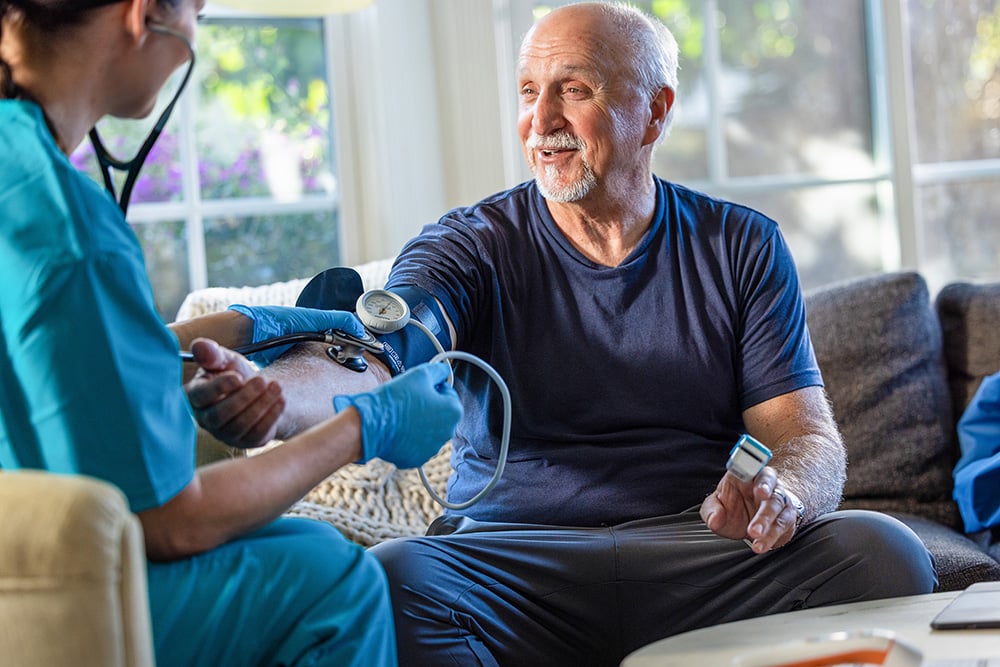Man having his blood pressure taken. Man having his blood pressure taken.